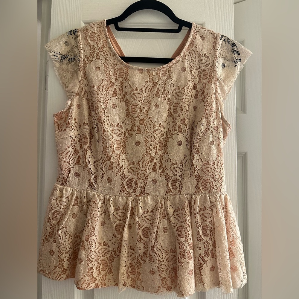 Golden pink lace blouse with zipper close from Anthropologie.